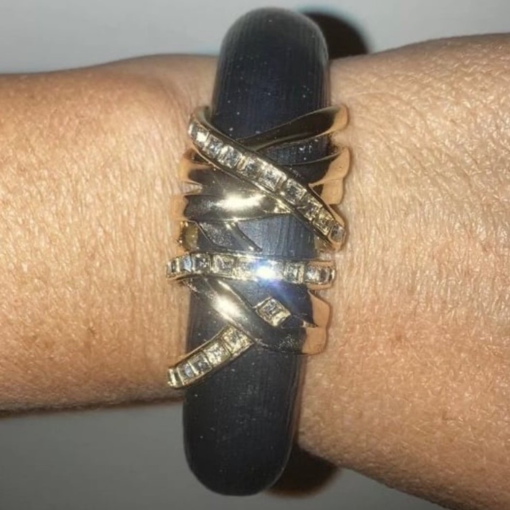 Alexis Bittar Black Lucite bangle Bracelet with crystals in gold tone setting.